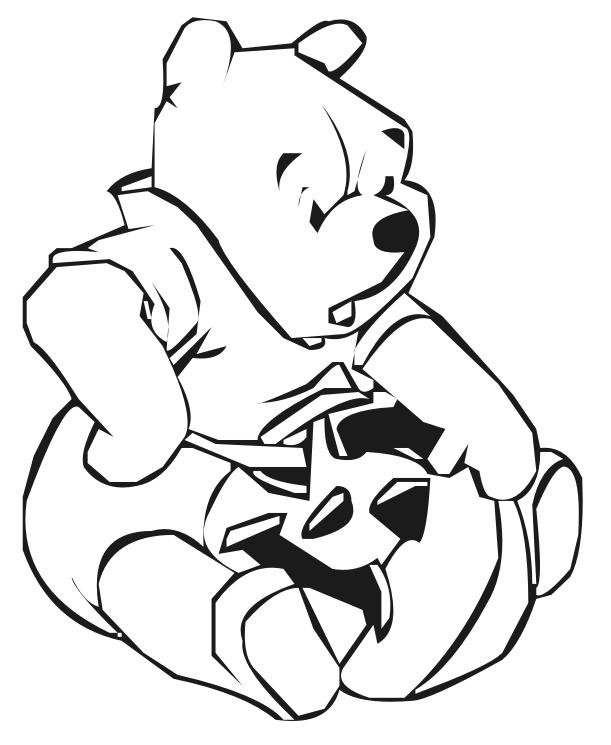 coloriage winnie prepare la citrouille d halloween